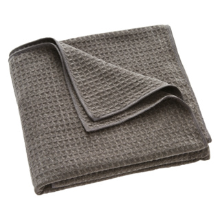 Drap Mozaic H2O at Home en tissu gaufré gris, plié de manière ordonnée